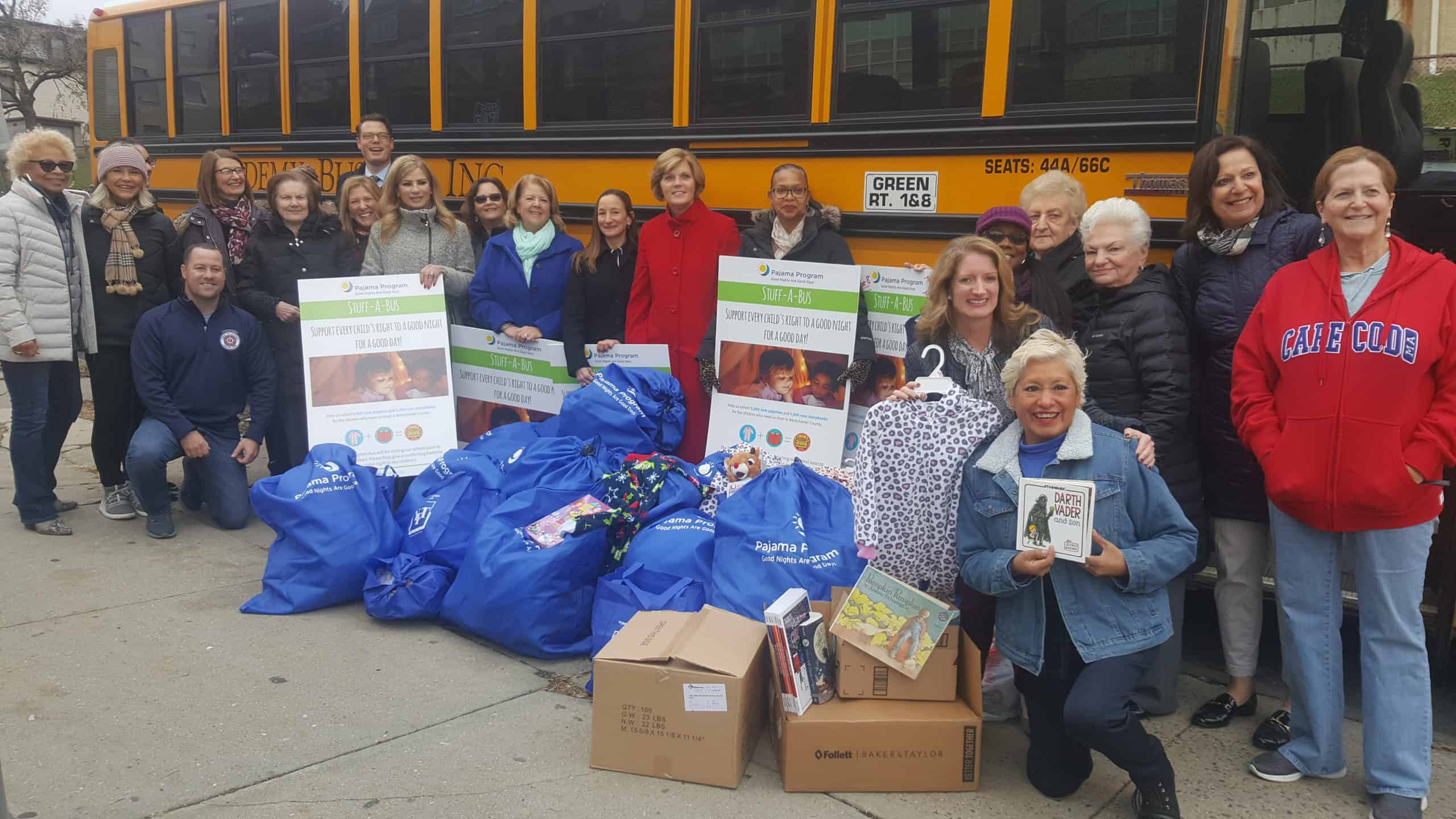Chamber Women Distribute PJs & Books to Children Chamber Women Distribute PJs & Books to Children