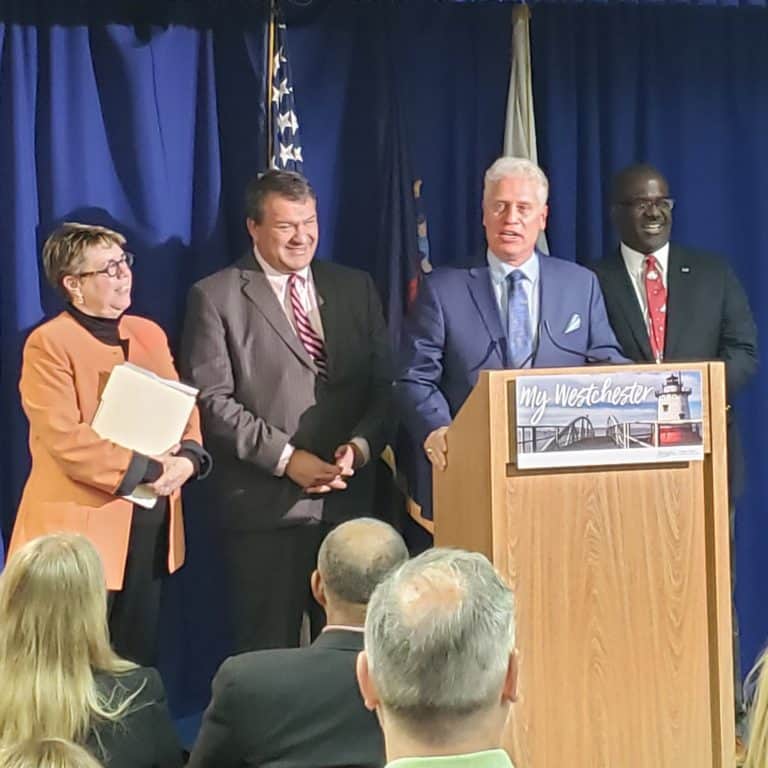County Budget Cuts Taxes,   Maintains Gov. Without Borrowing
