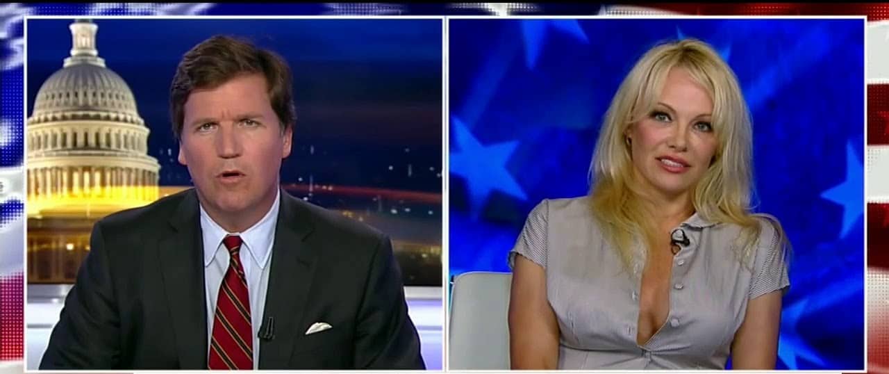 Tucker Carlson & Pam Anderson Ask for Pardon of Julian Assange Tucker Carlson & Pam Anderson Ask for Pardon of Julian Assange